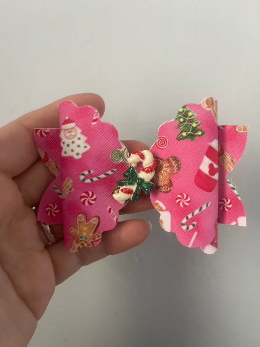 Pink candy cane Christmas bow